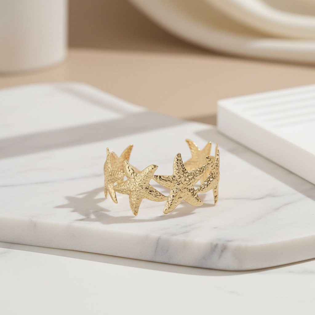 Golden tone starfish cuff bracelet